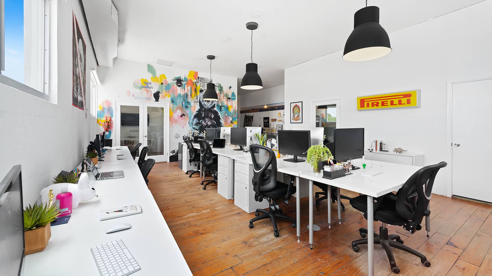 Workstations area at artistic-looking studio office | Think Twice studio